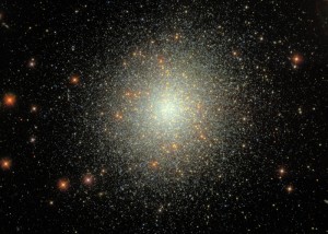 A bright cluster of white stars in the center of the image