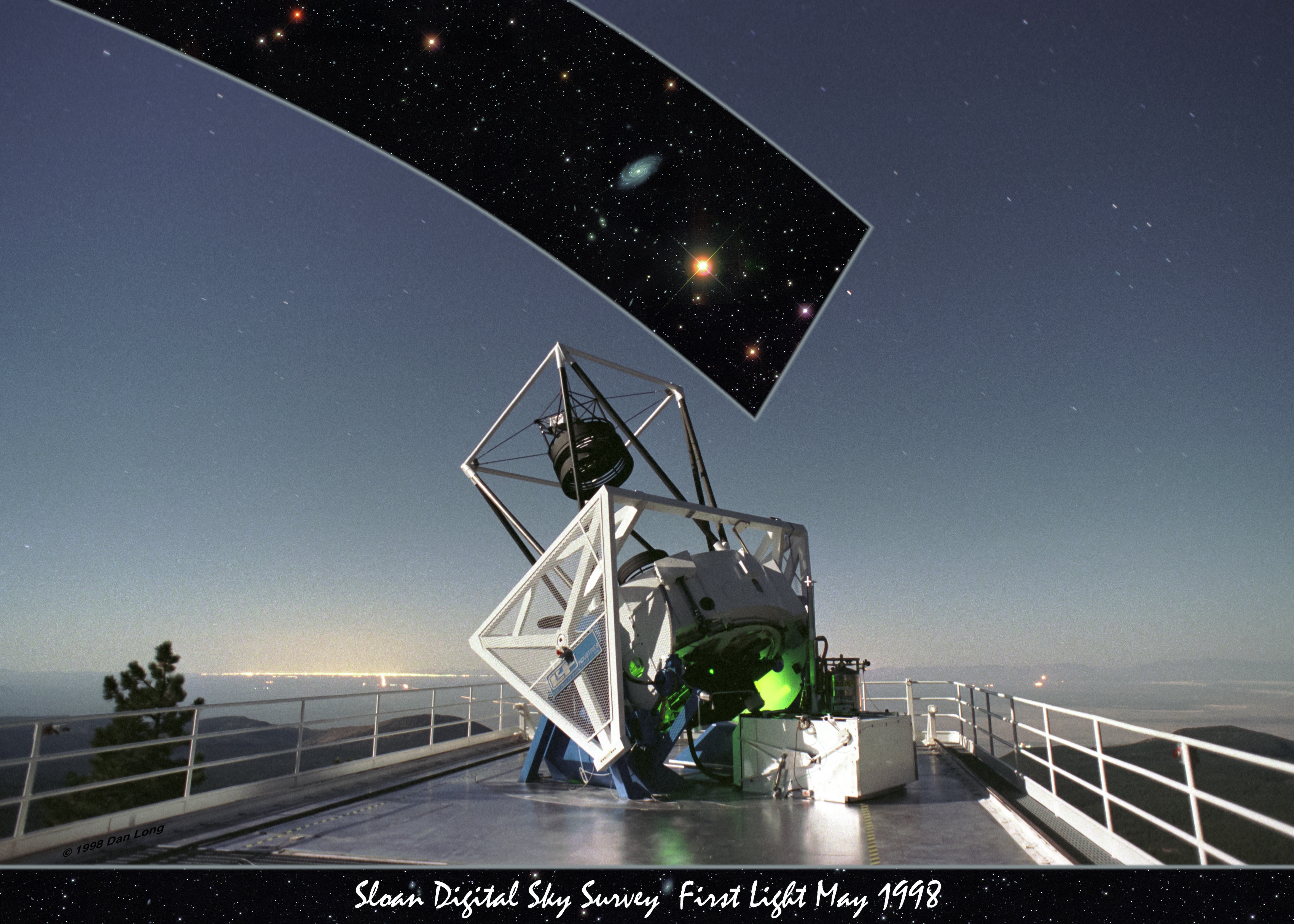 The SDSS first light sky image superimposed behind the telescope