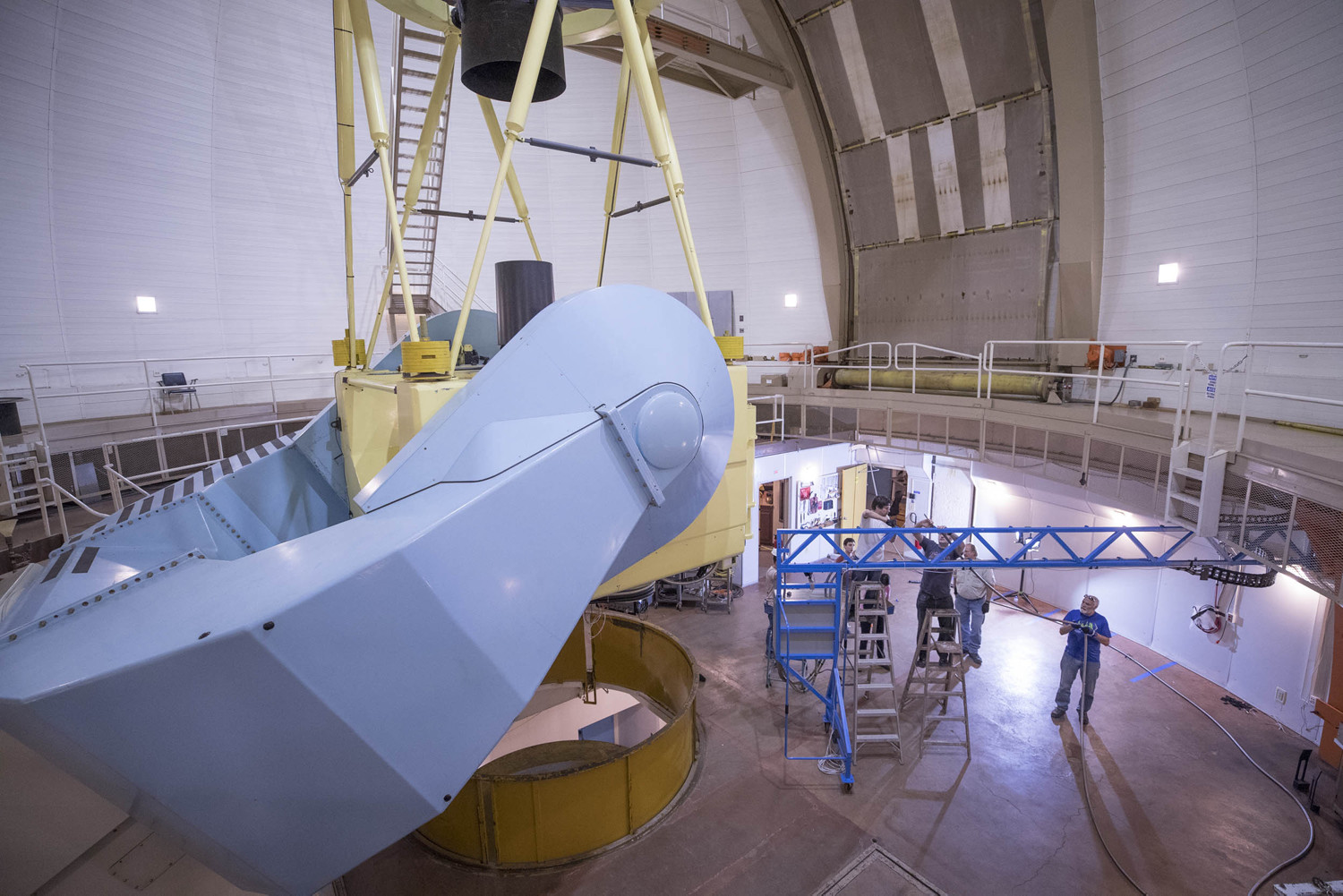 View of the du Pont telescope showing the boom that connects the spectrograph to the telescope. <em> Photo by Sanjay Suchak. Used with permission from <a href="https://news.virginia.edu/content/charlottesville-chile-powerful-apogee-ready-starring-role?utm_source=DailyReport&utm_medium=email&utm_campaign=news">here</a>.</em>