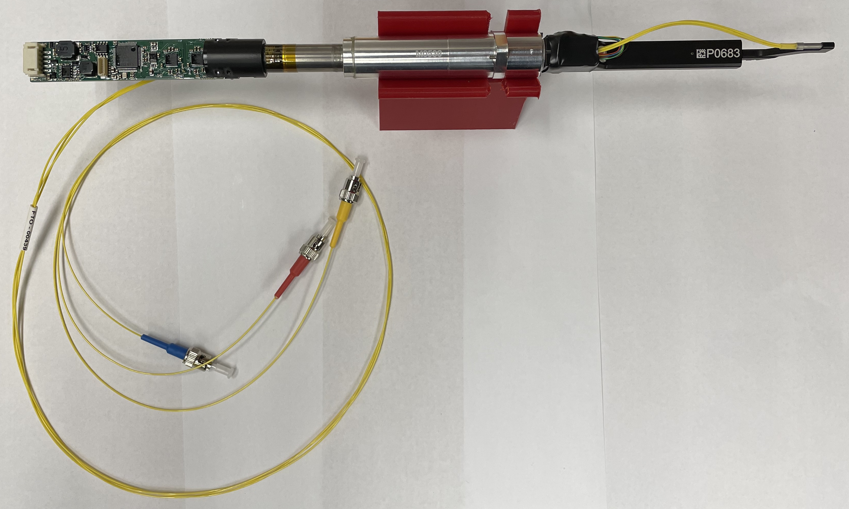 Photo of a robotic fiber positioner and optical fiber assembly.